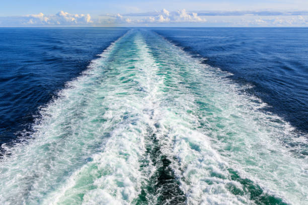 istock Trail on water surface behind the ferry 858335004