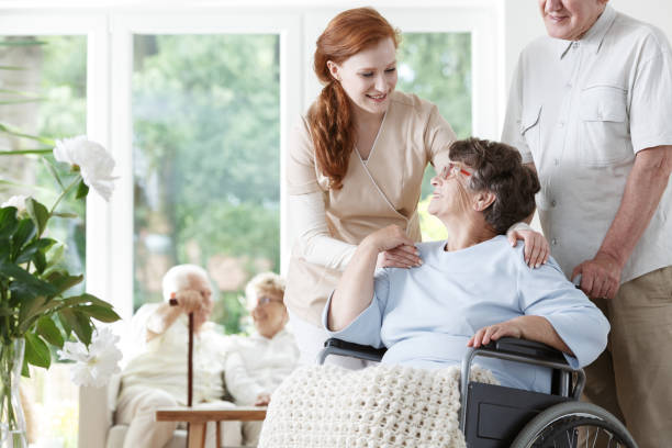 istock Caregiver holding lady's shoulders 858341398