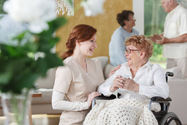 istock Nurse talking to senior 858341420