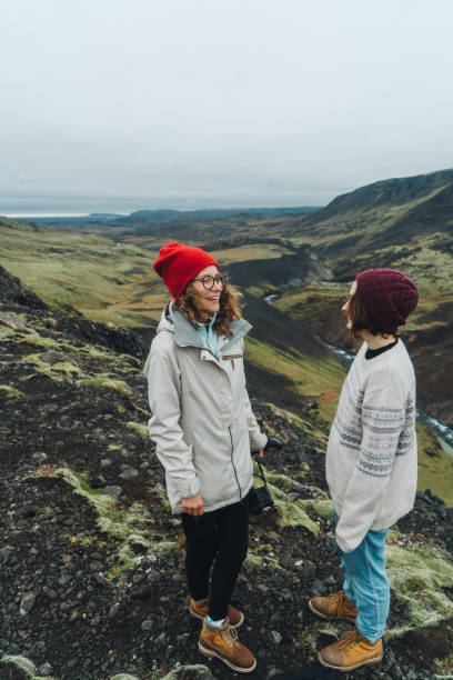 istock Two women walking near Haifoss  valley in mountains 858343984