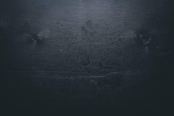 istock Black wooden surface. Free space for your text. Top view. 858348664