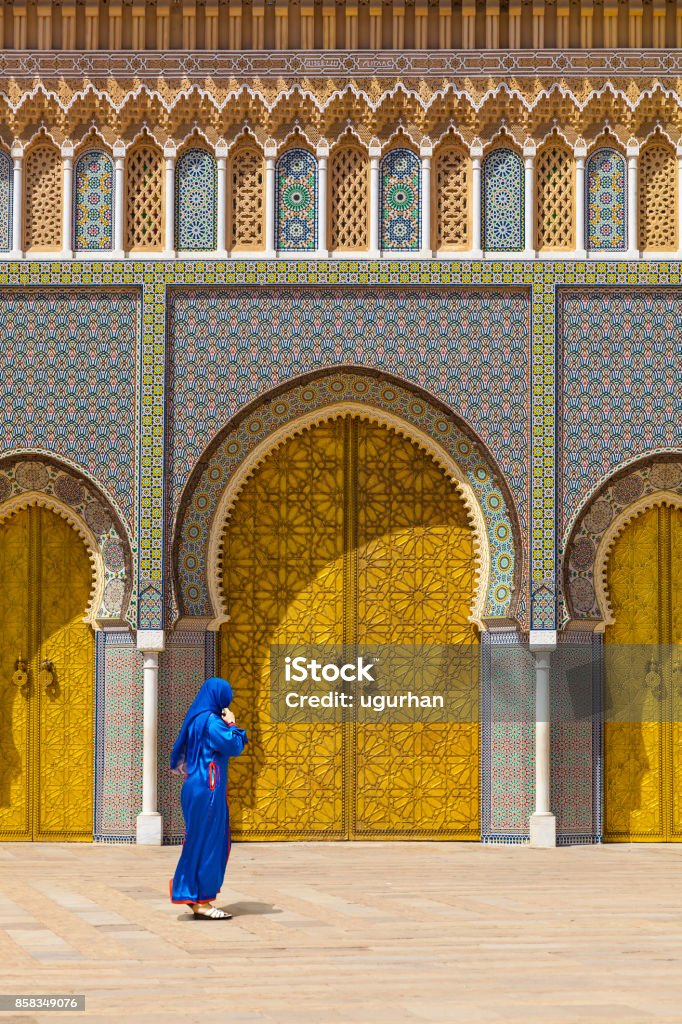Gold doors of the palace, Morocco The main entrance gold doors of the palace in fez, Morocco Morocco Stock Photo