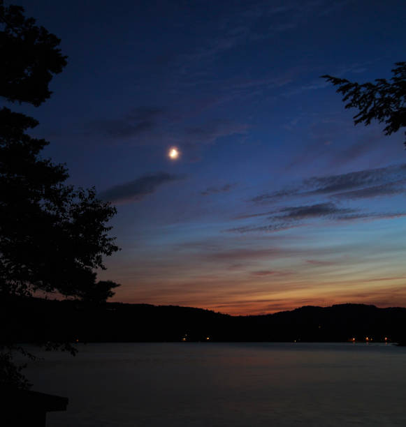 istock Moon over Squam Lake, New Hampshire 858358550