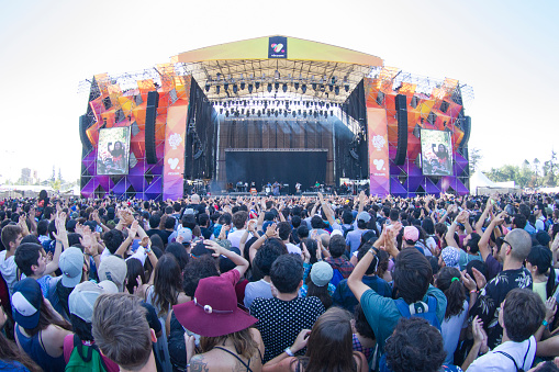 Santiago, Chile - March 19, 2017: Panoramic view of people in front of main stage of Lollapalooza at O'Higgins Park, one of the biggest music festivals in Chile.