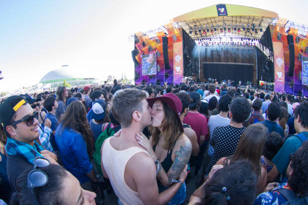Music Festival Santiago, Chile - March 19, 2017: Panoramic view of people enjoying in front of main stage of Lollapalooza at O'Higgins Park, one of the biggest music festivals in Chile. kiss entertainment group stock pictures, royalty-free photos & images