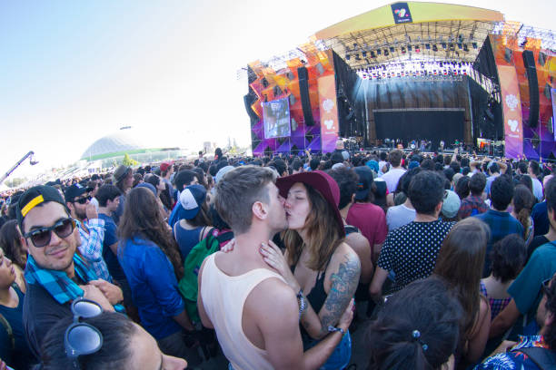 Music Festival Santiago, Chile - March 19, 2017: Panoramic view of people enjoying in front of main stage of Lollapalooza at O'Higgins Park, one of the biggest music festivals in Chile. kiss entertainment group stock pictures, royalty-free photos & images