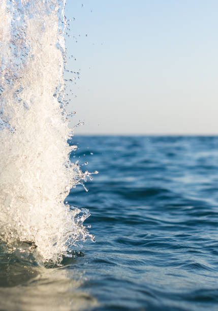istock large transparent splashes sea water on a Sunny day 858396016