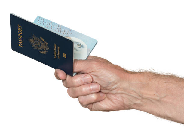 istock Senior caucasian hand holding US passport 858411582