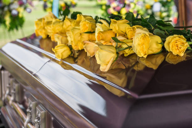 Flowers and Casket Casket in funeral service coffin photos stock pictures, royalty-free photos & images
