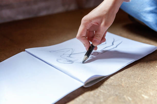 istock girl draws in album 858418938