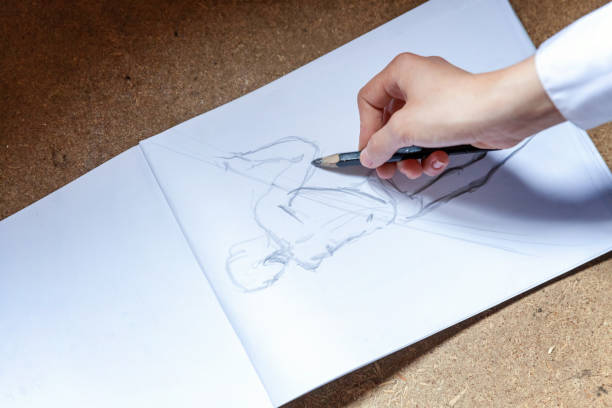 istock girl draws in album 858418964