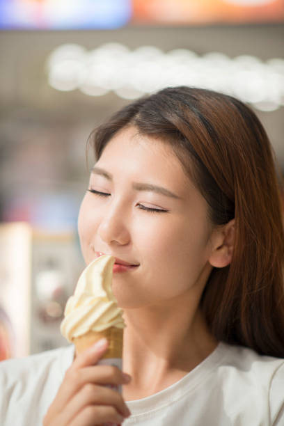 istock Girl with ice-cream 858422830