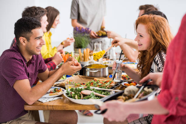 istock Friends meeting with vegan catering, 858426734