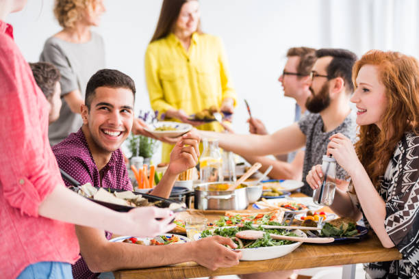 istock People trying delicious vegetable dishes 858426742