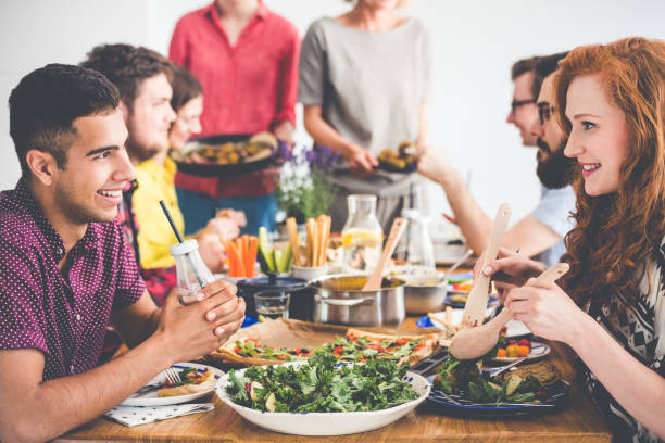 istock Couple at vegetarian catering party 858426758