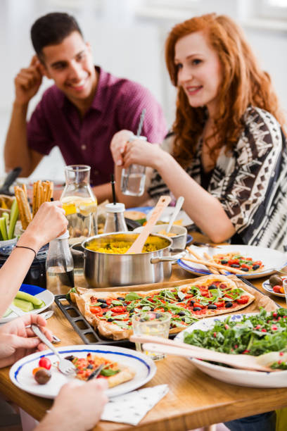 istock Veggie woman with friends 858426772