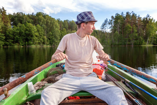 istock A fisherman in a boat 858427130