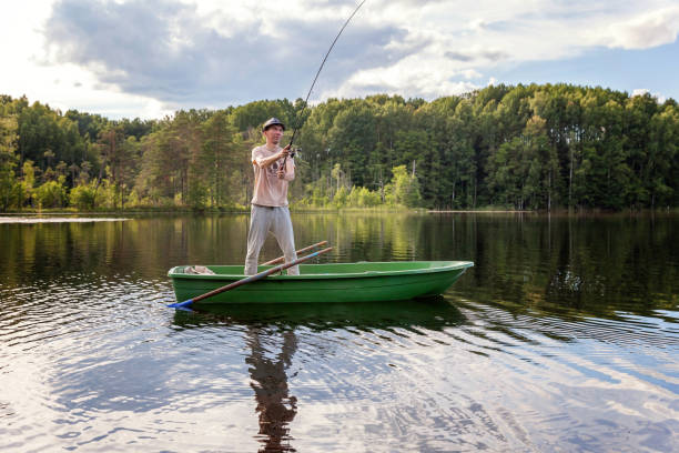 istock A fisherman in a boat 858429400