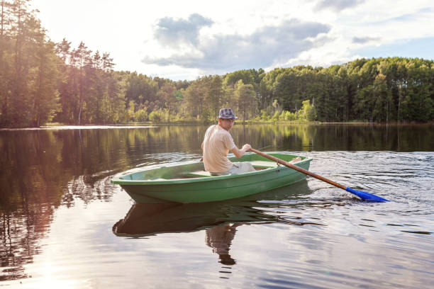istock A fisherman in a boat 858429440