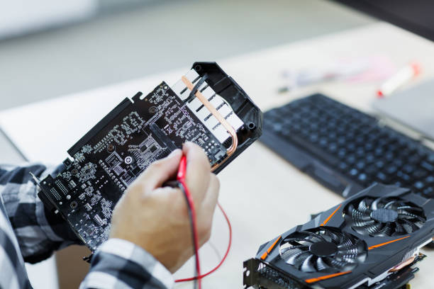 istock A professional man who repairs a graphics card. Cryptocurrency 858429748