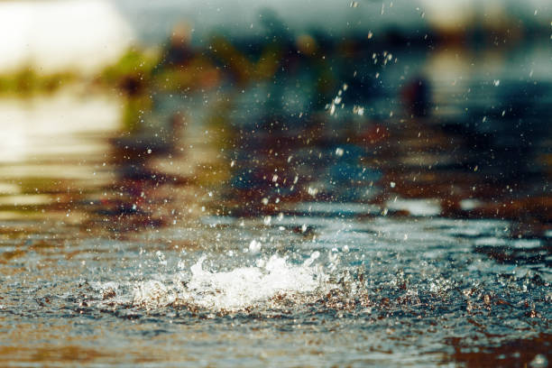 istock Water splashing in a fountain at sunset 858434460