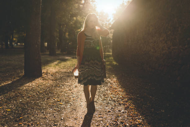 istock Woman having a coffee break on a autumn day 858436962