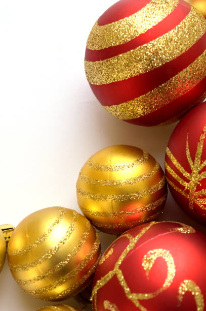 istock Christmas decoration (balls) on a white surface - portrati version 858436972