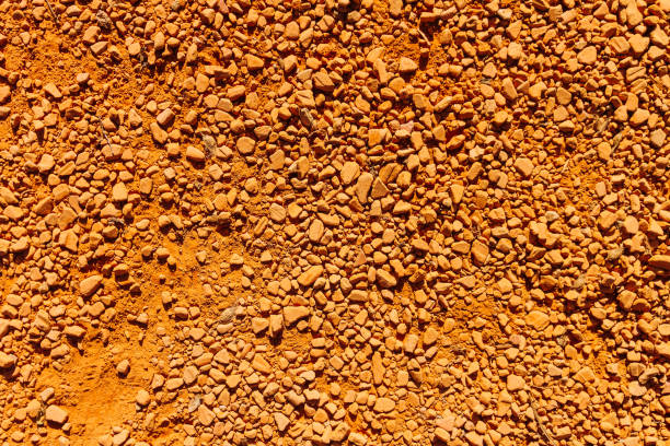 istock Texture of clay stones viewed from above 858441580