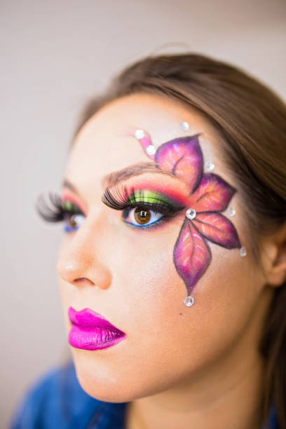 istock Beautiful woman with creative make-up 858451774