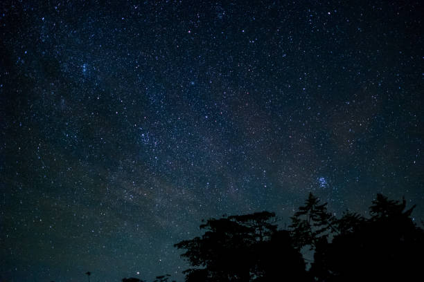istock milky way galaxy, Long exposure photograph, with grain. 858475820