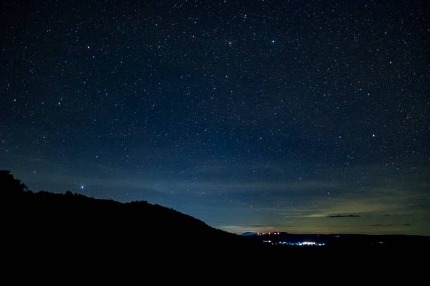istock milky way galaxy, Long exposure photograph, with grain. 858475910