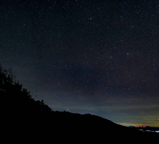 istock milky way galaxy, Long exposure photograph, with grain. 858475938
