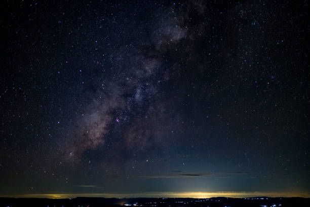 istock milky way galaxy, Long exposure photograph, with grain. 858476044