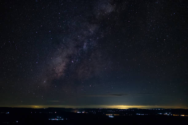 istock milky way galaxy, Long exposure photograph, with grain. 858476094