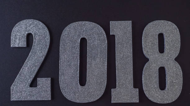 istock Silver numbers of 2018 Year on a black background. 858482586