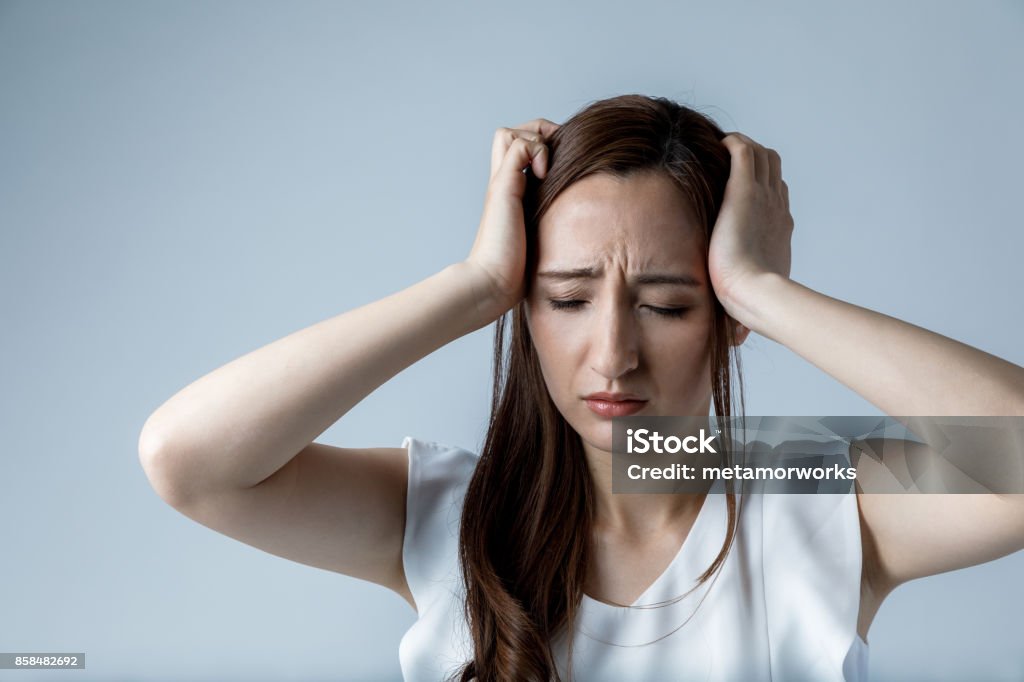young woman have a headache Women Stock Photo