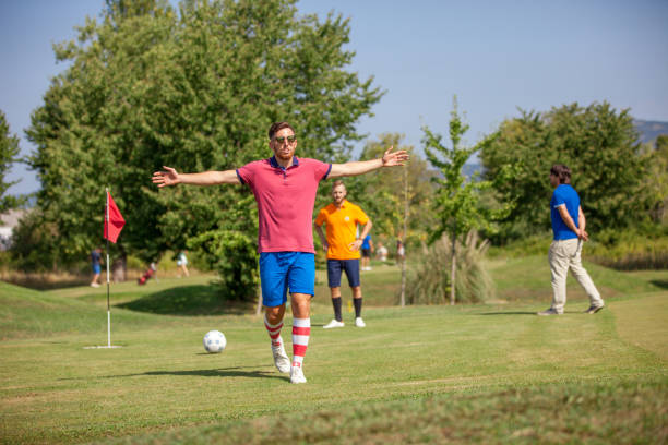 istock FootGolf Players and the Coach on the Golf Course 858486458