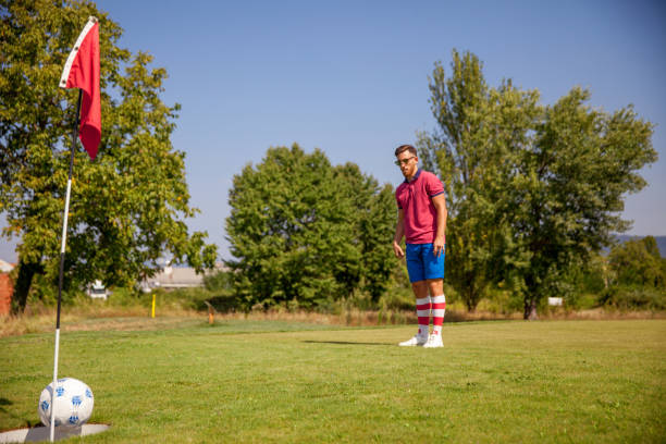 istock Soccer Ball entering the Hole 858486532