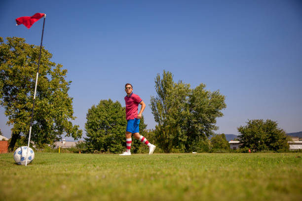 istock Soccer Ball entering the Hole 858486542