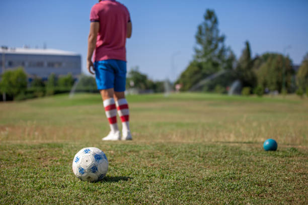 Soccer Ball and FootGolf Player on the Golf Course
