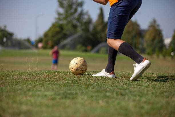 istock FootGolf Athlete before kicking Soccer Ball 858486636