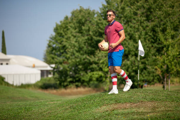 istock FootGolf Player Walking down the Hill on the Golf Course 858486672