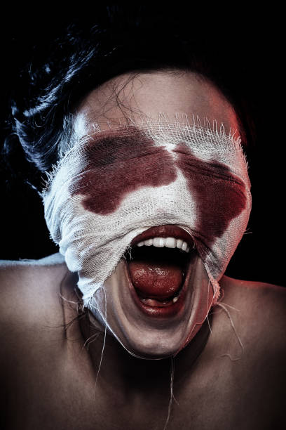 istock wounded bloody woman 858493302