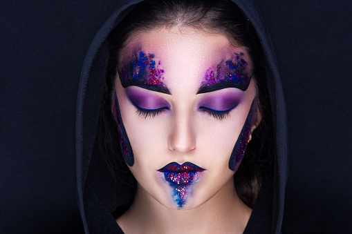 Creative make-up new conceptual idea. black white bold body art painting. Crazy new graphic abstract picture on woman face surrealistic . professional photo. Creativity art lines conceptual planet sun