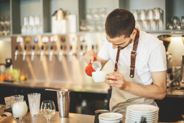 istock Young barista making the best coffee 858498966
