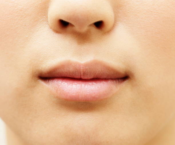 istock Lips of a woman 858499108