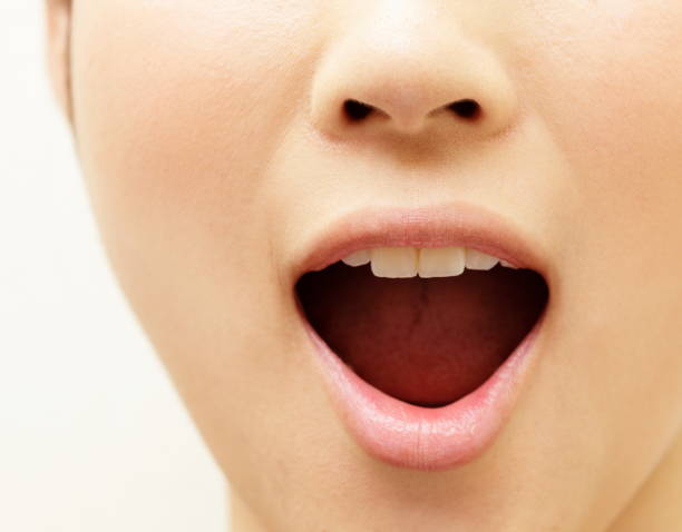 istock Woman open a mouth 858499170