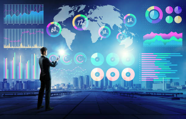 istock businessman holding a smart phone and various business information. 858499372