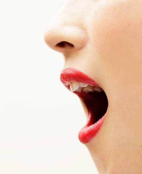 istock Woman open a mouth, side view 858499538