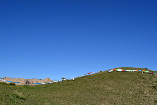 istock The prayer flags around the mountain behind Labrang or Xiahe, in Amdo Tibet 858507348